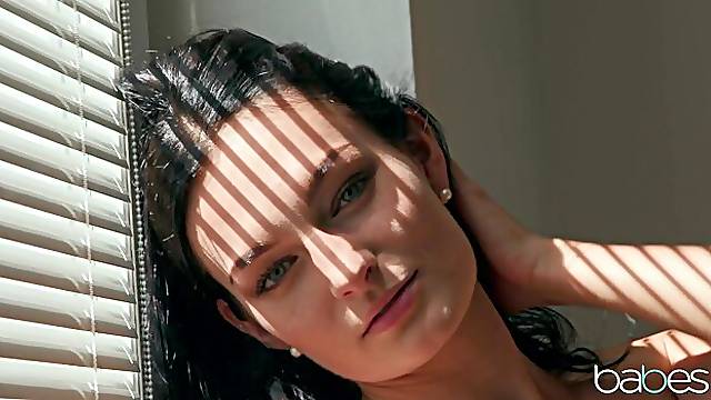 Soloing brunette Leanne Lace is touching her little pink pussy