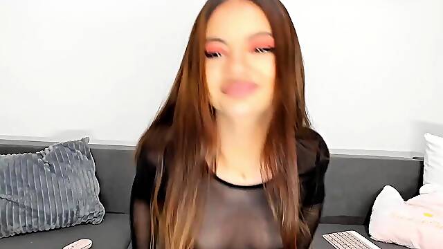 Amateur redhead Jacqueline with glasses masturbates