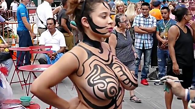 Big tits girl public body painting