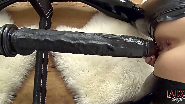 Anal spreaders and huge dildos used in a kinky amateur compilation